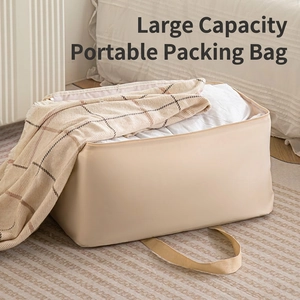 Beige large capacity quilted storage bag with durable handles for bedding and clothes