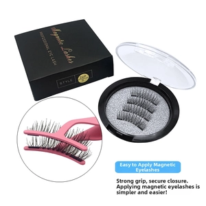 Macro detail of magnetic eyelashes set with pink applicator and black storage case