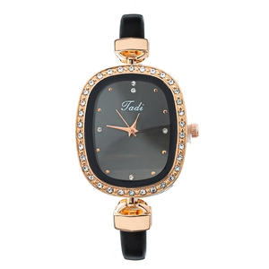 Elegant rose gold oval watch for women with rhinestone bezel and slim black leather strap