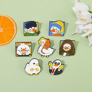 Creative cartoon duck enamel pins featuring famous art parodies on a fresh green background
