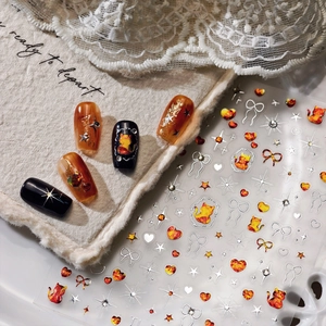 Cartoon silver stamping nail art stickers with cat and star patterns on press-on nails