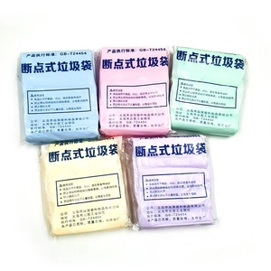 Detailed view of 5-color disposable garbage bag rolls with easy-tear perforated design