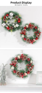 Detail of Christmas wreath featuring natural pine cones, red berries and cotton flowers