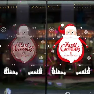 Detail of Santa Claus window stickers with snowflakes and pine tree silhouettes