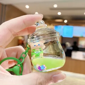 Porte-clés créatif en forme de bouteille avec ours assis et liquide de sable mouvant