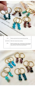 Detail of stainless steel hoop earrings with colorful natural crushed stone tassels