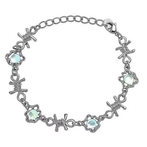 Barbed wire moonstone bracelet in silver with adjustable lobster clasp and blue gems