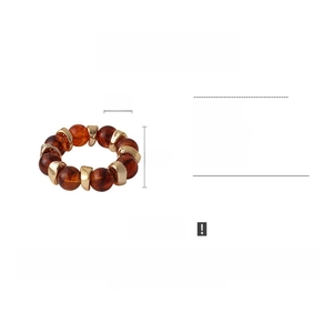 Detailed view of bohemian amber acrylic beads and gold metal spacers with 25cm length info