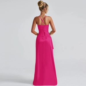 Hot pink evening dress detail showing an open back with elegant crisscross tie design