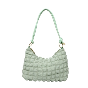 French style mint green ruched hobo bag with gold hardware and waffle texture