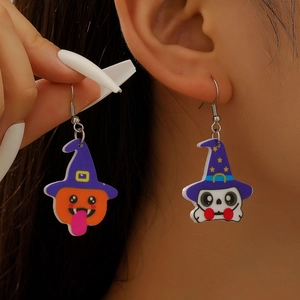 Detailed view of Halloween acrylic pumpkin and ghost earrings with purple wizard hats