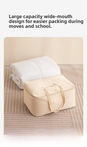 Large storage bag detail showing 58x30x40cm size for 3kg winter quilts and handles