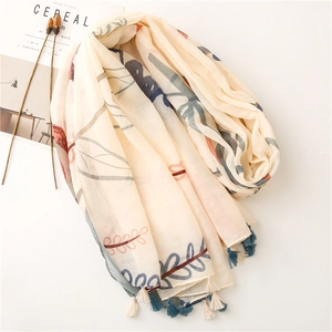 Floral cotton linen scarf in beige with vintage botanical print and blue fringe tassels