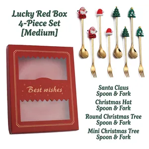 Golden stainless steel Christmas cutlery set with festive motifs in red gift box
