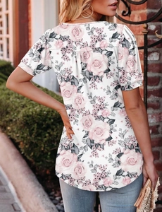 Detailed back view of a white floral round neck short sleeve top with pink rose print