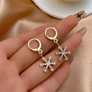 Elegant gold snowflake tassel earrings with sparkling zircon crystals for women