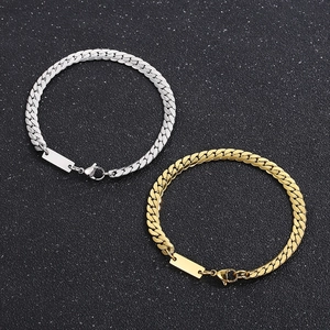 Gold and silver Cuban link bracelets with customizable ID plates for hip-hop style