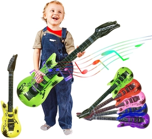 Kid holding a green inflatable rock guitar toy with colorful musical notes background