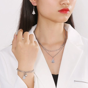 Three-piece stainless steel jewelry set with Christmas tree pendants on silver chains