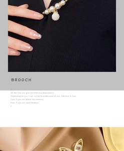 Detailed view of pearl geometric brooch on silk fabric and worn on black garment