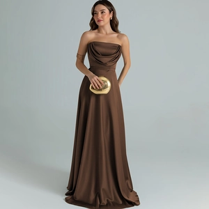 Detail of elegant dark brown satin evening dress with strapless pleated bodice design
