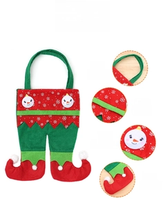 Detail view of felt Christmas elf gift bag with snowman patch and hanging strap