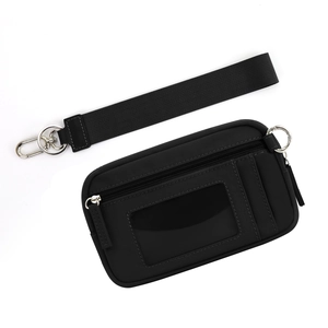Detail of black nylon card holder with transparent ID window and detachable wrist strap