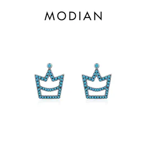 S925 sterling silver crown stud earrings with turquoise stones on white background