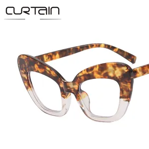 Cat eye blue light blocking glasses with tortoiseshell and transparent frames