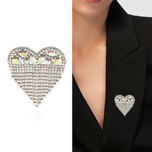 Elegant heart brooch with AB crystals on black blazer and white background product view