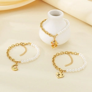 Elegant gold titanium steel pearl bracelet set with heart and moon charms for women