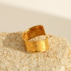 Minimalist 18K gold plated stainless steel ring with a hammered texture on a raw stone
