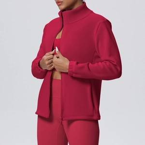 Detail view of burgundy fleece sports jacket with stand collar and zipper closure
