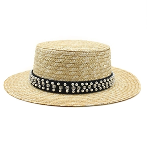 Chapeau de paille canotier tressé avec ruban noir orné de perles et de strass chics