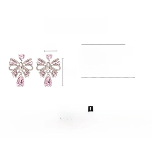 Dimensions détaillées et poids des boucles d'oreilles nœud en cristal rose
