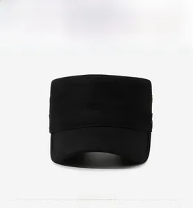Front view of black cotton flat top army cap with a decorative band and gold cross badge