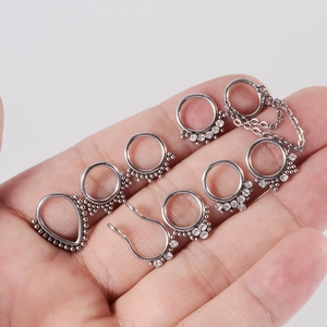 Set of 8 silver stainless steel septum rings and nose studs with crystals and chains