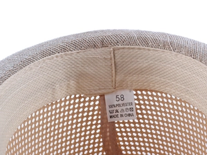 Detail view of the breathable mesh lining and 100% polyester label inside the summer fedora hat