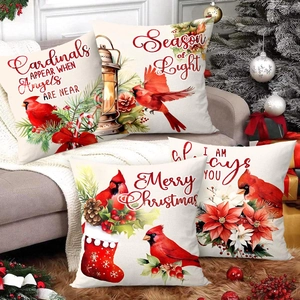 Set of four Christmas cardinal throw pillow covers with festive red bird and pine motifs