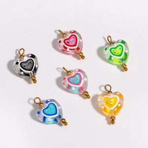 Set of six colorful heart-shaped glass pendants with gold loops for DIY jewelry making