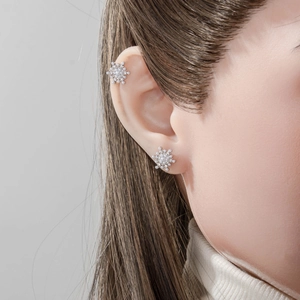 Elegant silver snowflake earring set with micro-inlaid pearls and zirconia studs