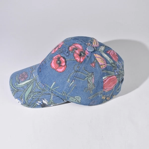 Unisex denim baseball cap with vintage floral patterns on a dark blue background