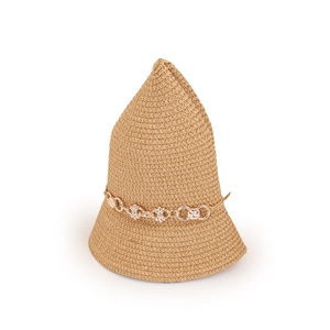 Close-up of woven straw hat featuring an elegant gold flower chain decoration
