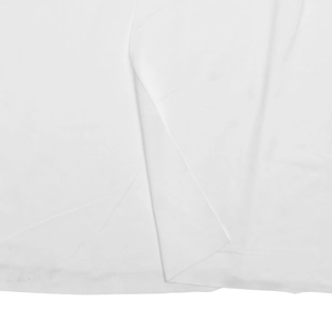 Close-up detail showing the soft texture and draped fabric of this white summer maxi dress