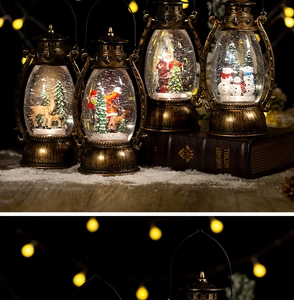 Set of four vintage bronze Christmas lanterns with snow globe scenes and warm glowing lights
