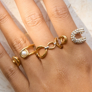 Modern gold plated stainless steel ring set with pearl pin design and rhinestone C charm