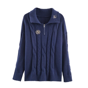 Navy blue cable knit polo sweater with half-zip collar and golden embroidery details