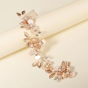 Vintage bridal hair comb with gold leaves, pink flowers and pearls for wedding hairstyles