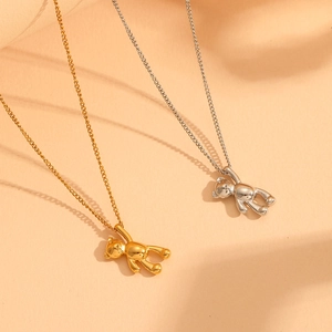 Minimalist stainless steel bear pendant necklaces in gold and silver finishes