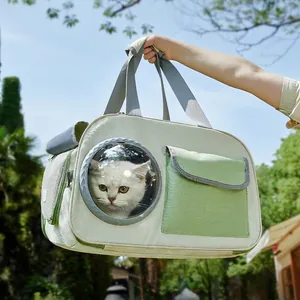 Portable pet carrier bag with clear capsule window and green oxford cloth for cats